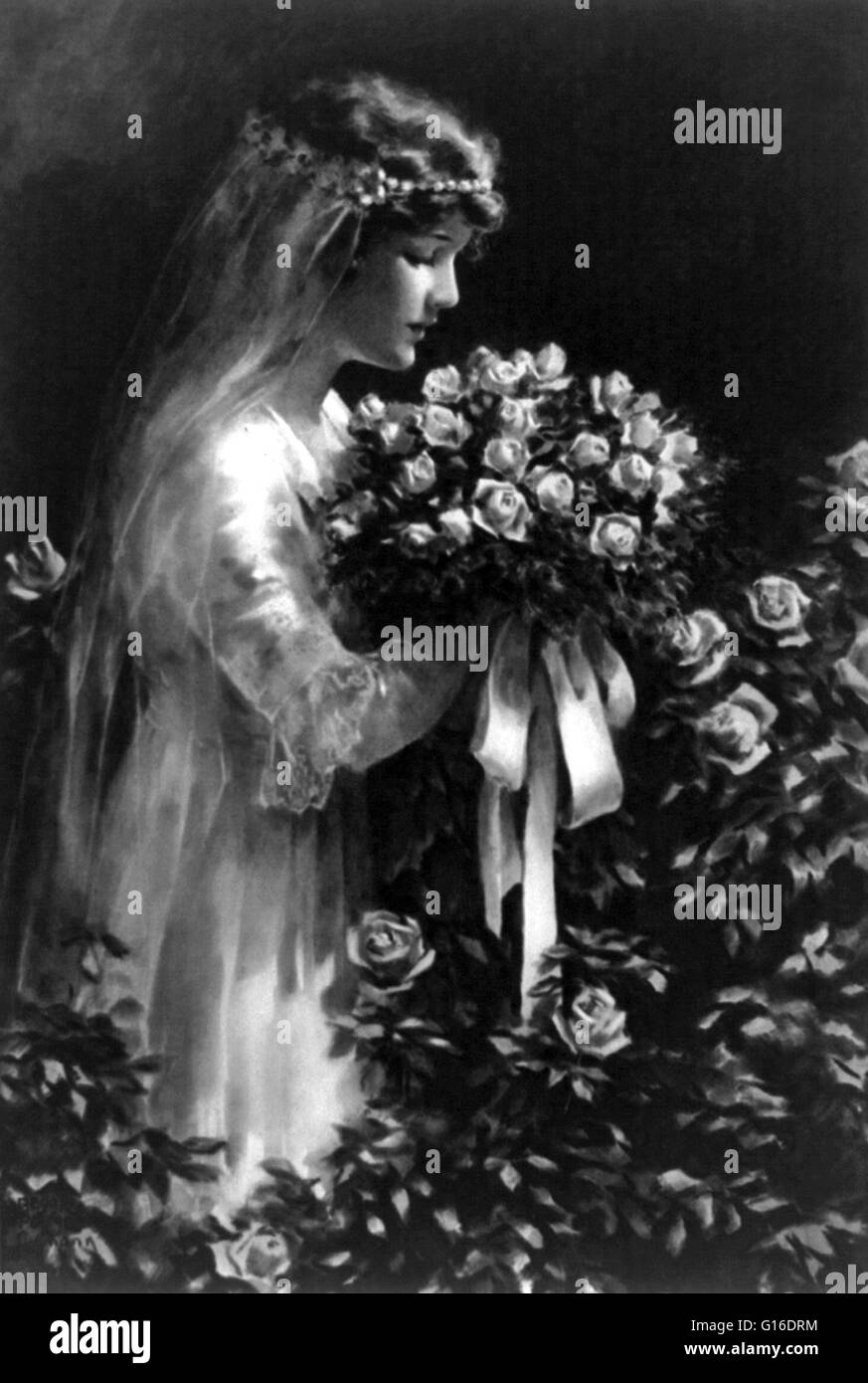 Jeune femme en robe de mariage holding bouquet de fleurs. Une robe de mariage ou robe de mariage est le vêtement porté par la mariée au cours d'une cérémonie de mariage. La couleur, le style et l'importance de la robe de cérémonie peut dépendre de la religion et de la culture de l'égalité de mariage Banque D'Images