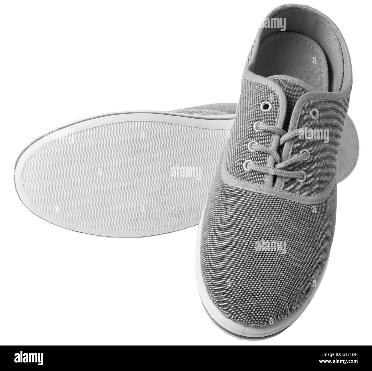 Sneakers gris isolé sur fond blanc Banque D'Images