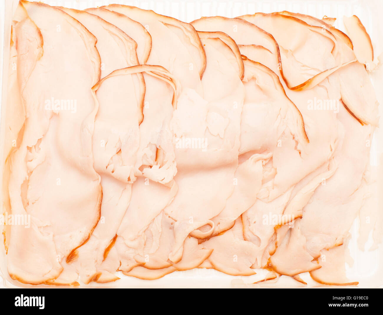 Tranches de poulet rôti de viande cuite brown background texture pattern Banque D'Images