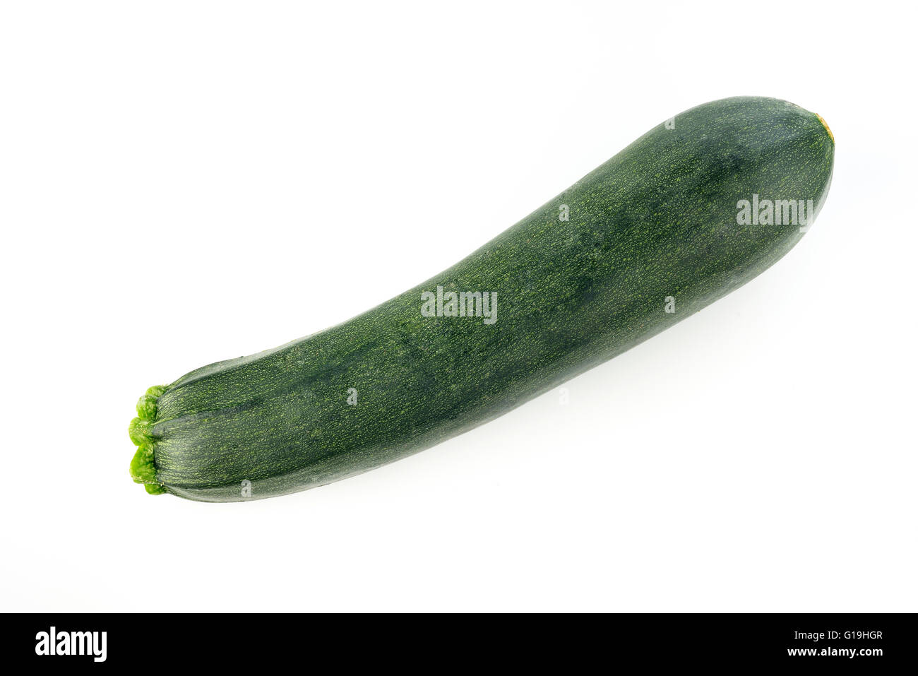 Courgette verte sur fond blanc Banque D'Images Courgette verte sur fond blanc Banque D'Images