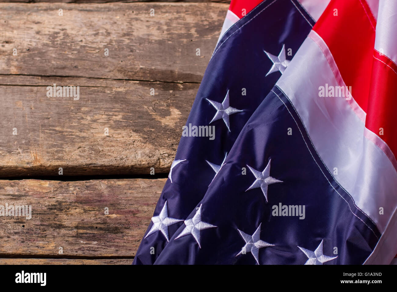 Drapeau USA sur fond de bois. Banque D'Images