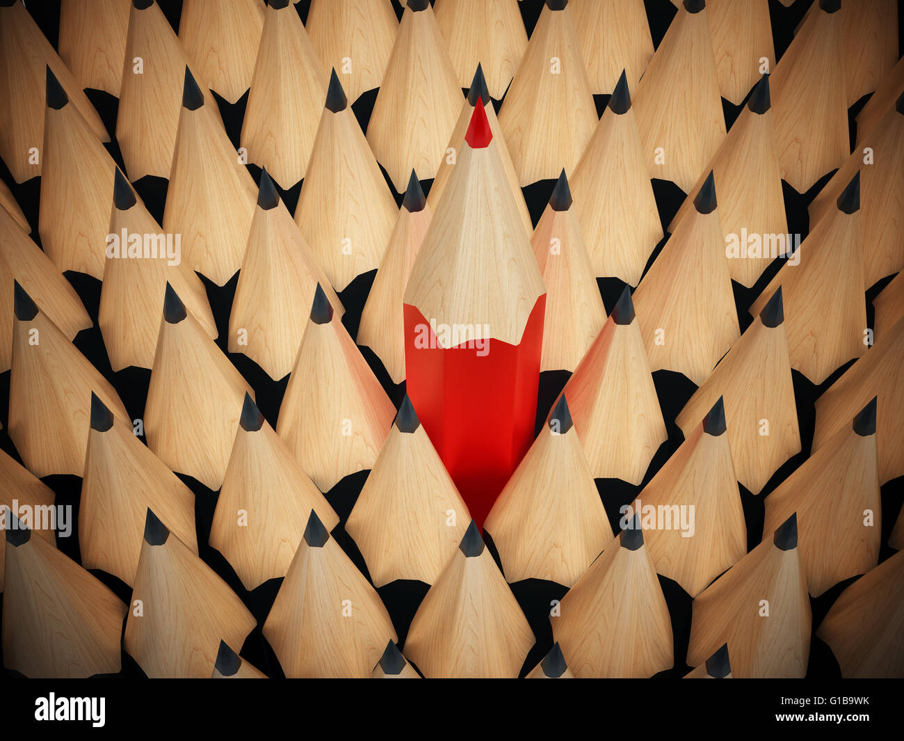 Crayon rouge parmi les crayons noirs. Banque D'Images