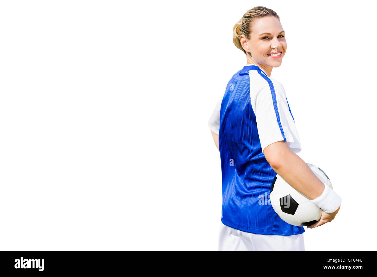 Femme posant avec un joueur de soccer ball Banque D'Images