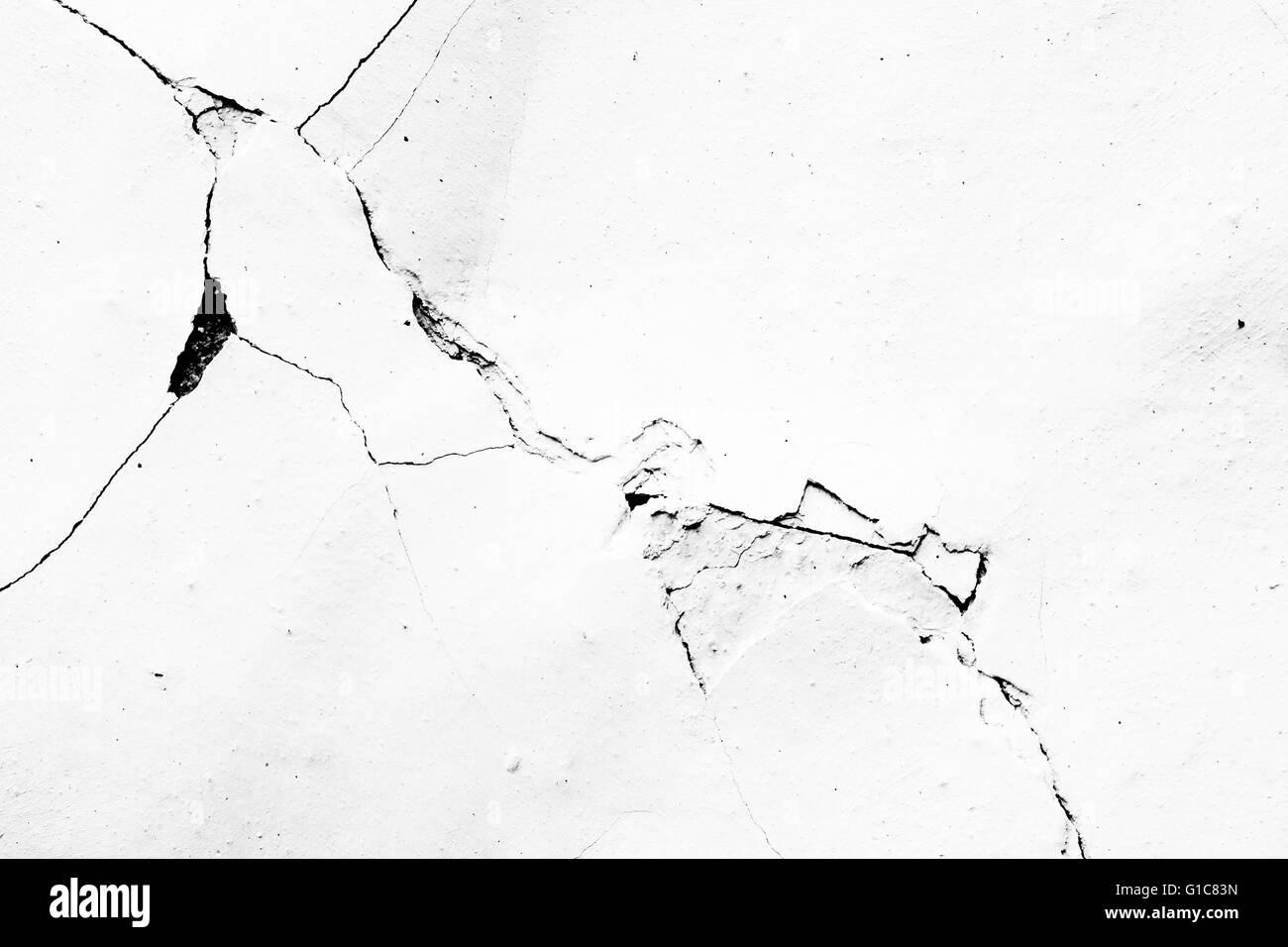 Les fissures dans le plâtre - grunge texture - couche pour photo editor Banque D'Images