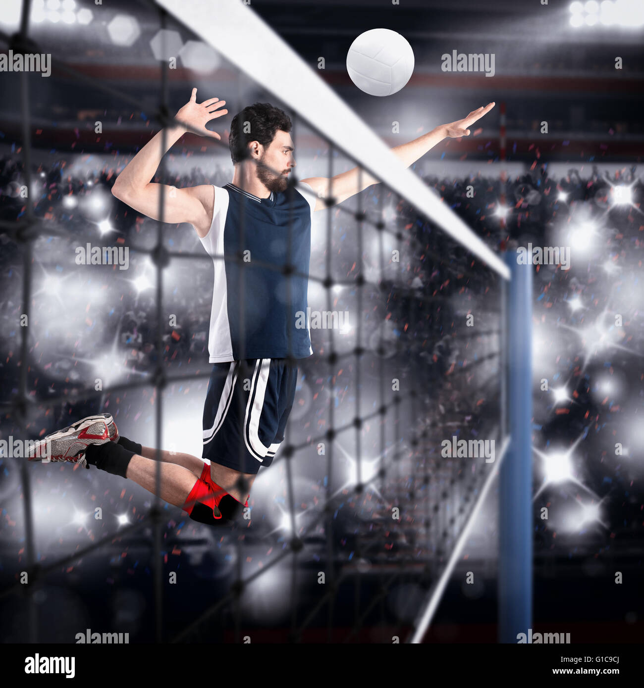 Le joueur frappe le ballon de volley-ball Banque D'Images