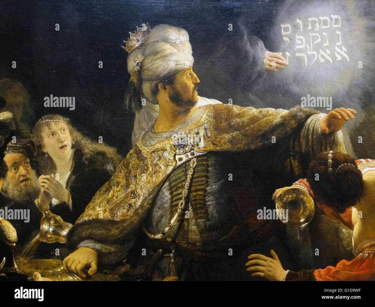 Détail de la fête de Belshazzar 1635 ; peinture de Rembrandt van Rijn 1606 - 1609. L'histoire de Belschatsar, et l'écriture sur le mur vient de l'Ancien Testament Livre de Daniel. Le roi babylonien Nabuchodonosor pillé le Temple de Jérusalem et a volé le sacré des coupes en or. Son fils Belshazzar utilisé ces tasses pour une grande fête où la main de Dieu est apparu et a écrit l'inscription sur le mur prophesizing la chute du règne de Belshatsar. Banque D'Images