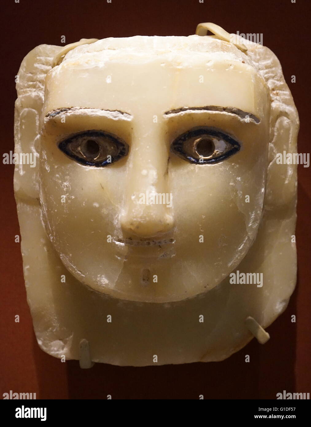 Tête en pierre sculpté avec incrustation de verre coloré de Ma'rib, capitale de la royaume sabéen. En date du 1er siècle avant J.-C. Banque D'Images