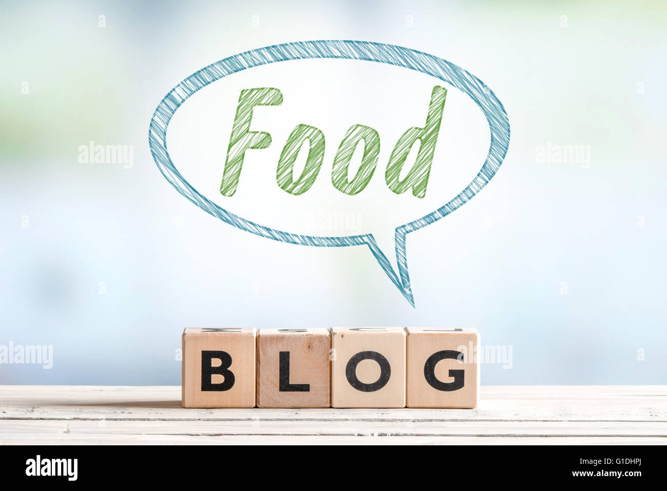 Blog de l'alimentation message signe sur un bureau en bois avec texte Banque D'Images