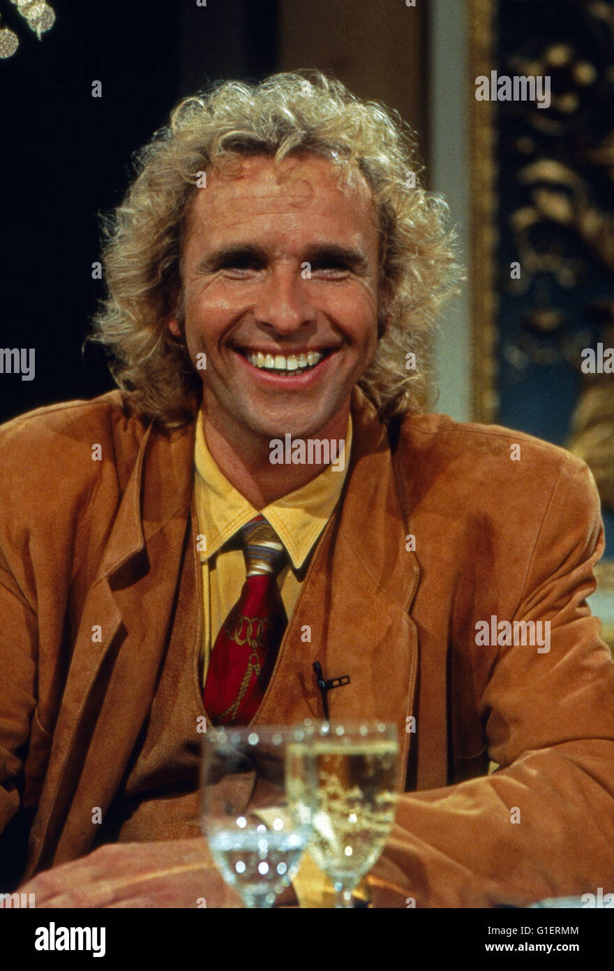 Der Deutsche modérateur Thomas Gottschalk bei 'Wetten, dass', Deutschland 1990 er Jahre. Présentateur de télévision allemand Thomas Gottschalk dans son spectacle 'Wetten, dass', l'Allemagne des années 1990. Banque D'Images