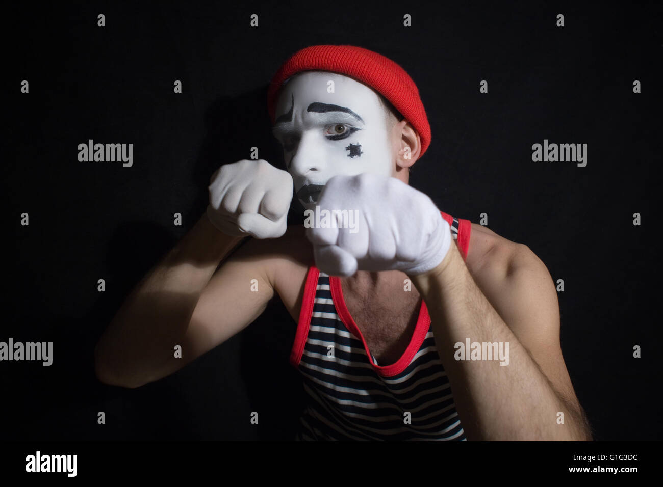 Portrait de combats mime sur un fond noir Banque D'Images