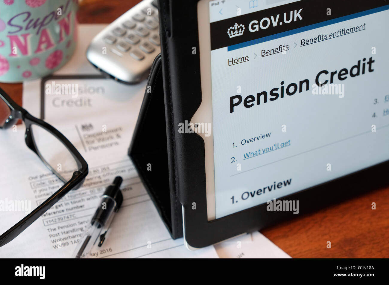 Crédit de pension de l'état sur l'ordinateur Tablet Banque D'Images