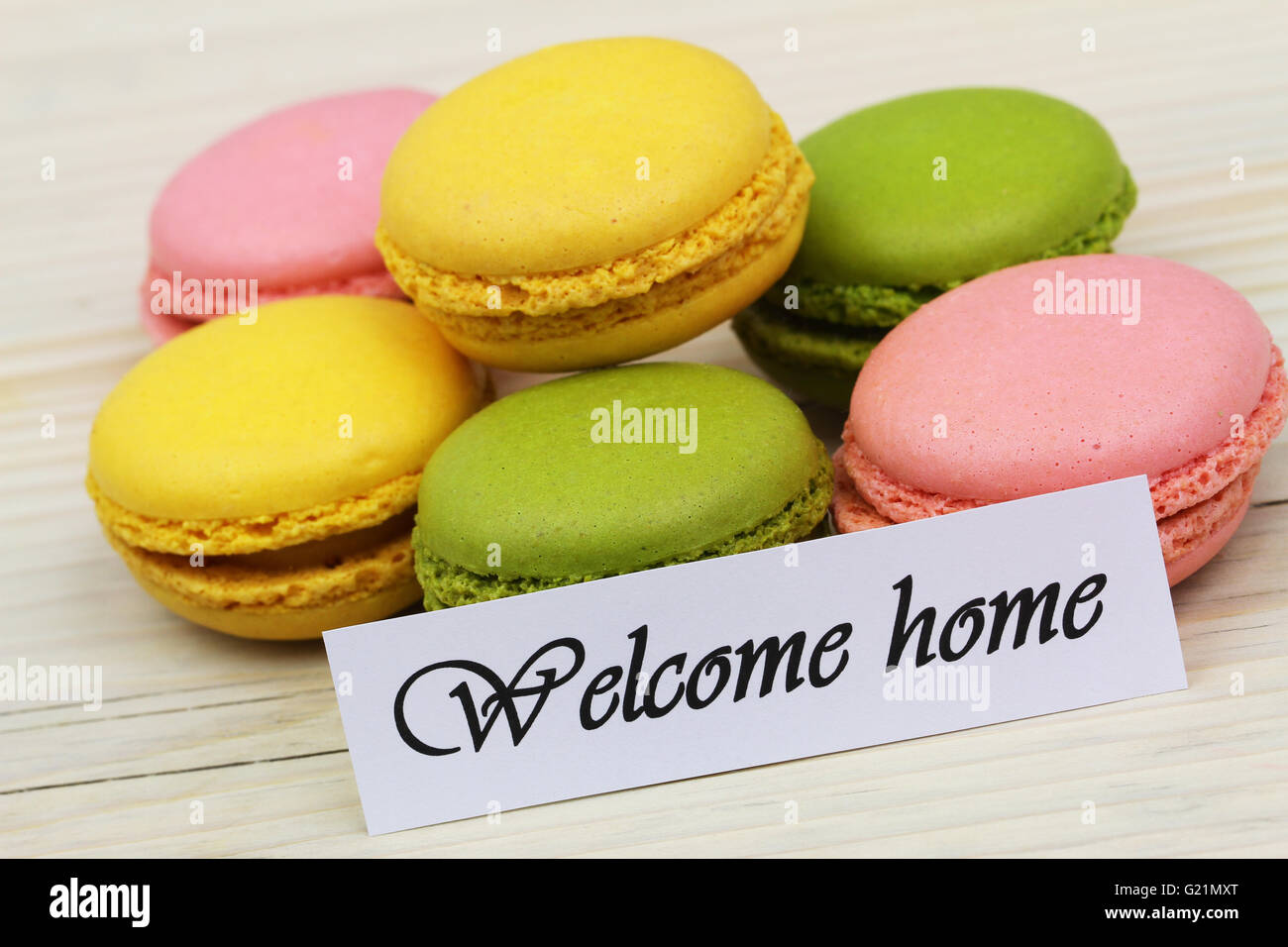 Bienvenue accueil carte avec macarons sucrés colorés Banque D'Images