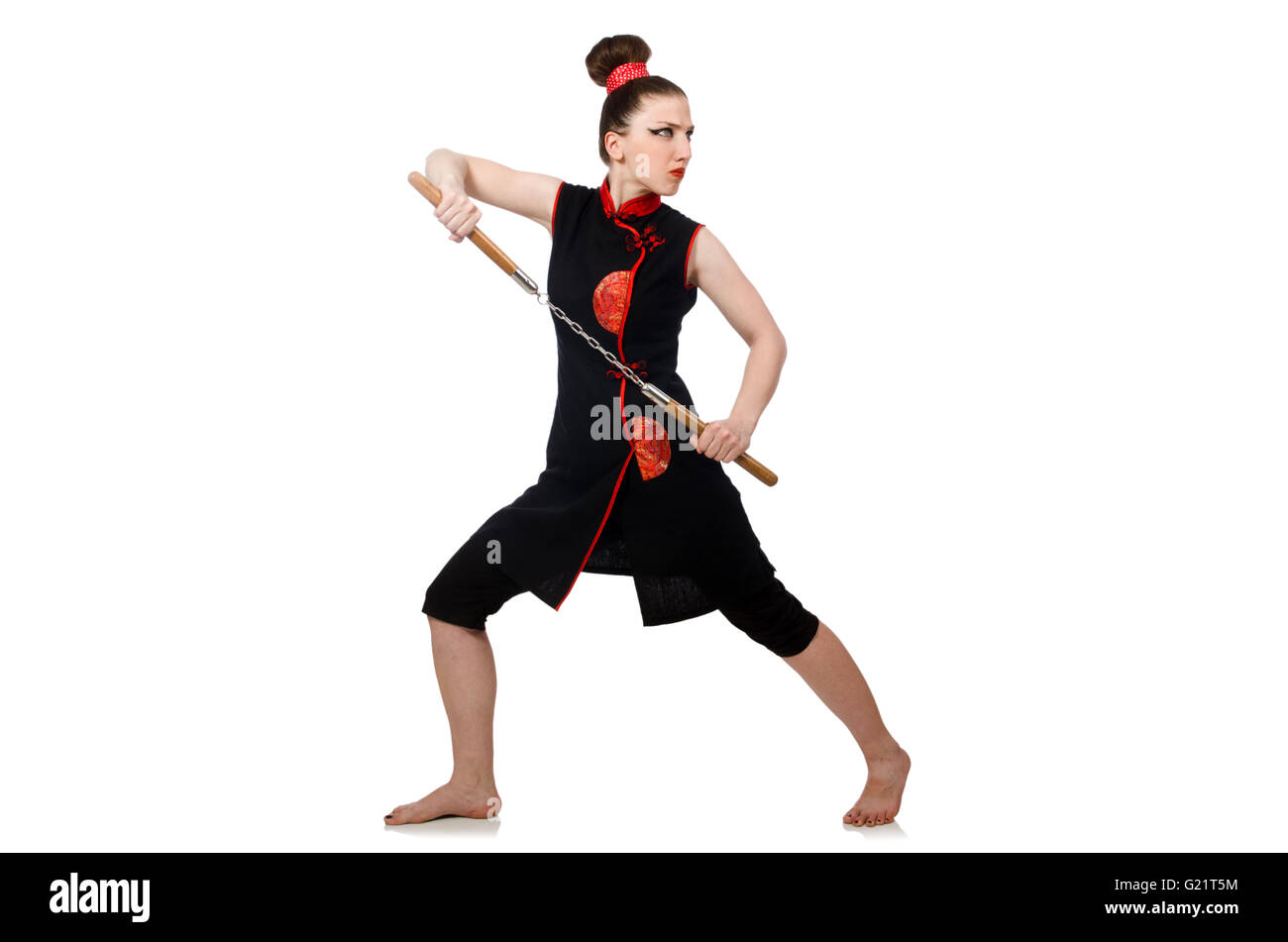 Femme drôle avec nunchucks isolated on white Banque D'Images