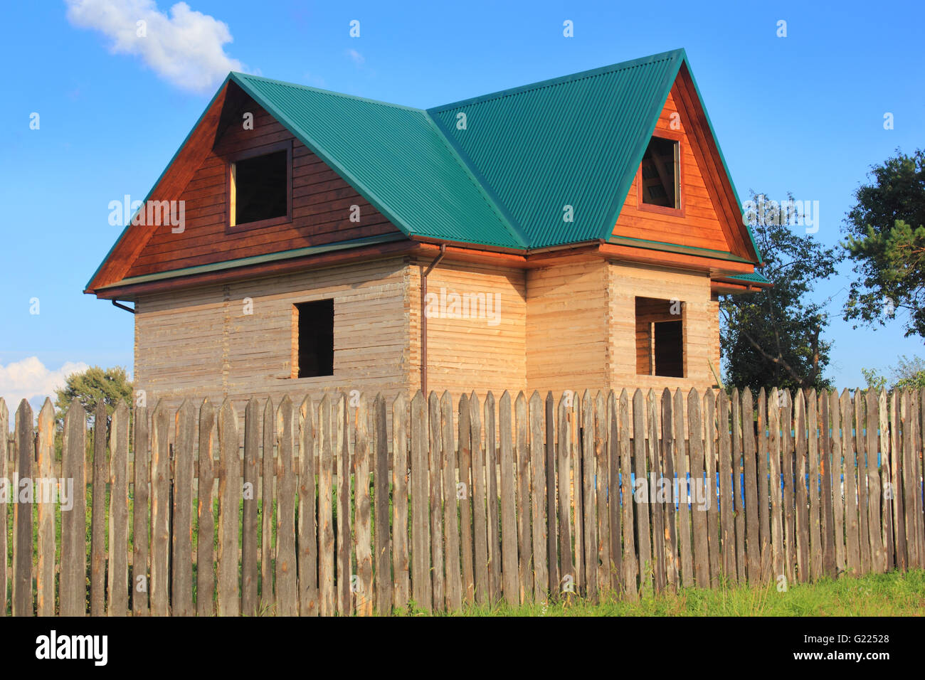 Maison en bois en construction derrière la photo Banque D'Images