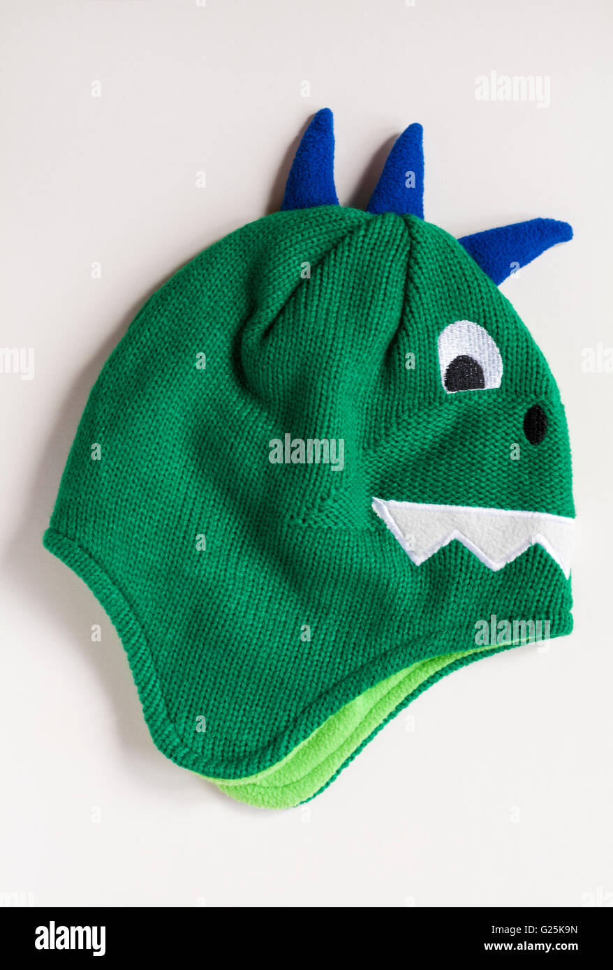 Dinosaure vert nouveauté hat hat isolé sur fond blanc Banque D'Images