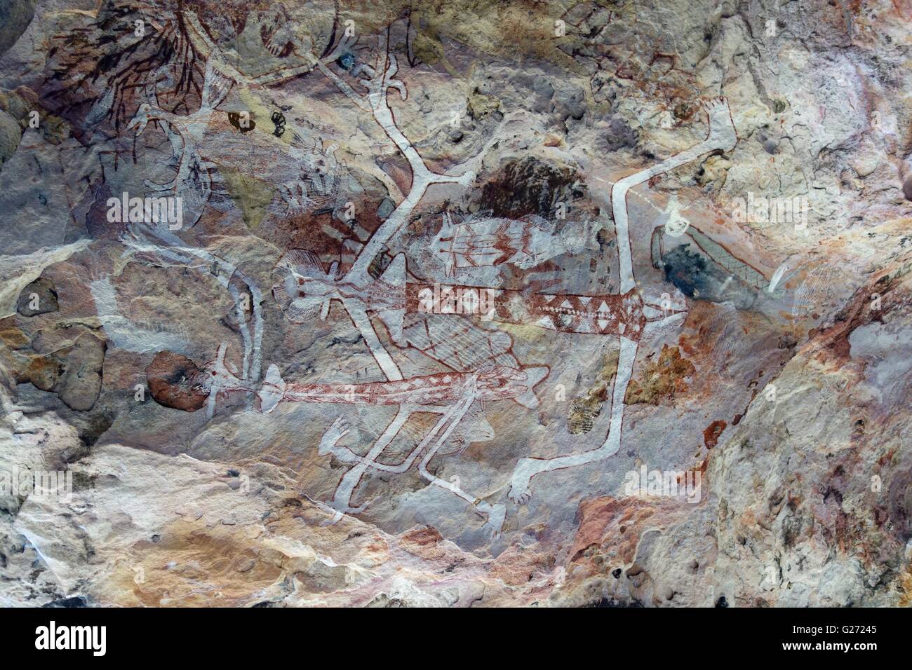 Peintures rupestres autochtones anciennes connu comme "rock art" trouvés au mont de la Rochère, à l'ouest de la terre d'Arnhem, dans le Territoire du Nord, Australie Banque D'Images