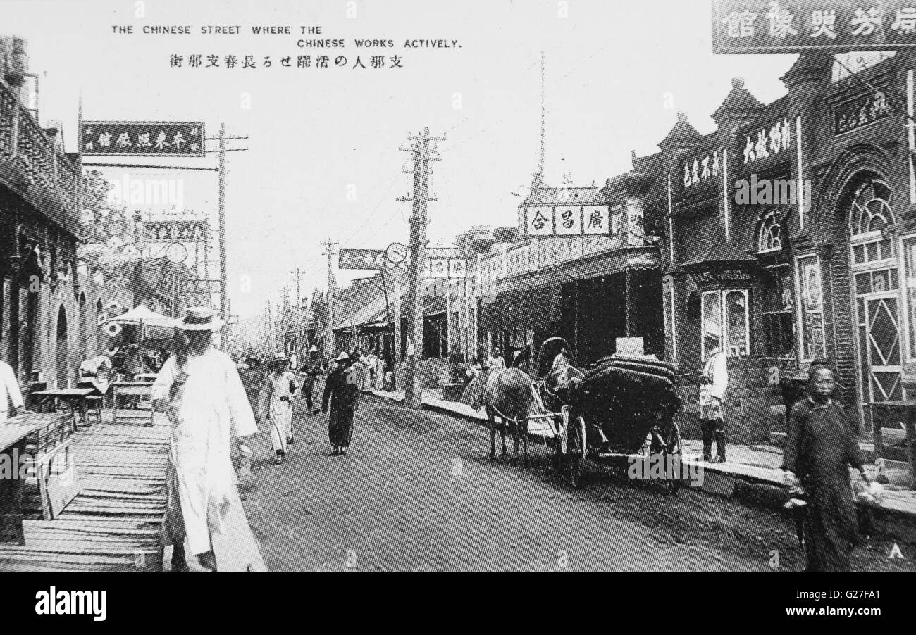Chinese street, Changchun, la Mandchourie. c 1916. Banque D'Images