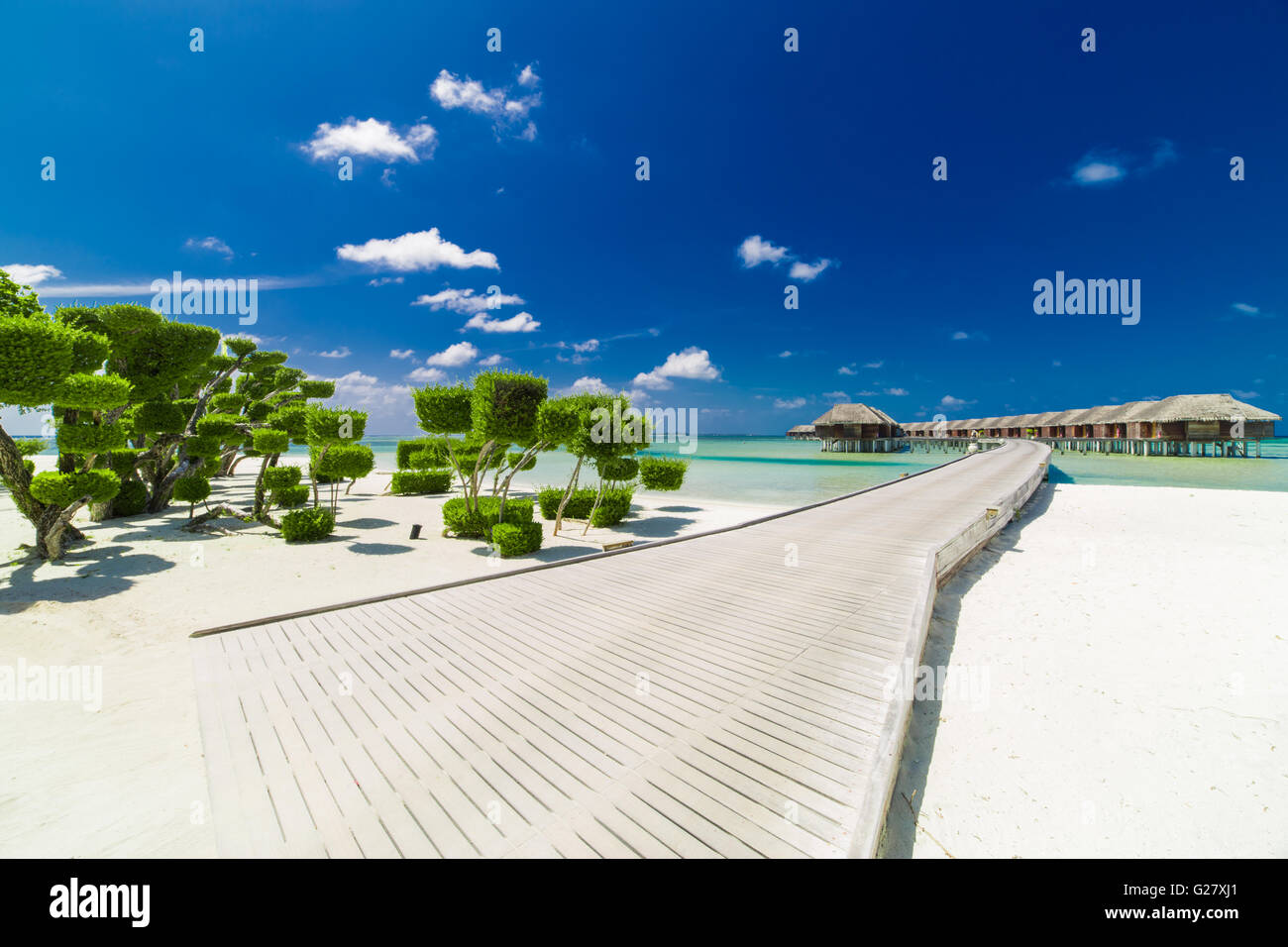 Villas sur fond de plage, aux Maldives Banque D'Images