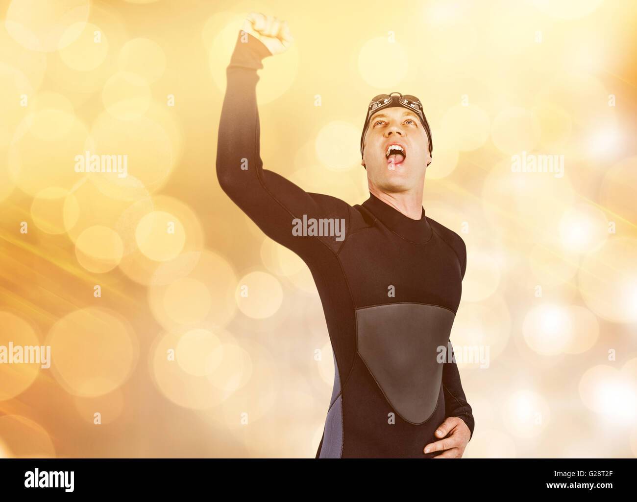 Image composite du nageur posant après la victoire Banque D'Images