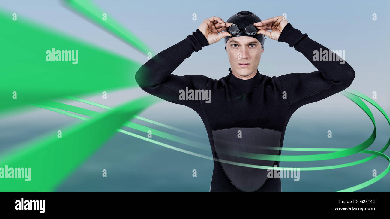 Image composite du nageur dans la combinaison portant lunettes de natation Banque D'Images