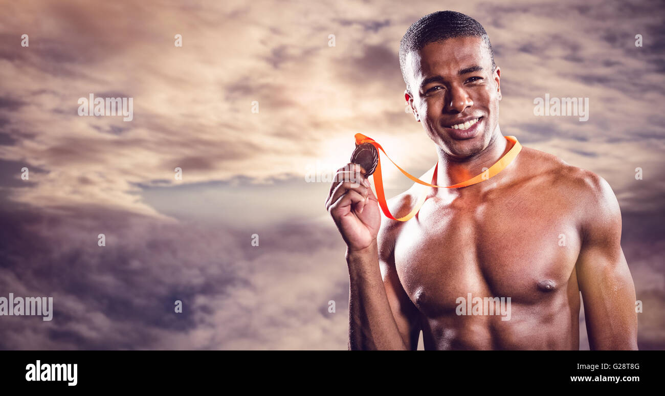 Image composite de fighter holding médaille d Banque D'Images