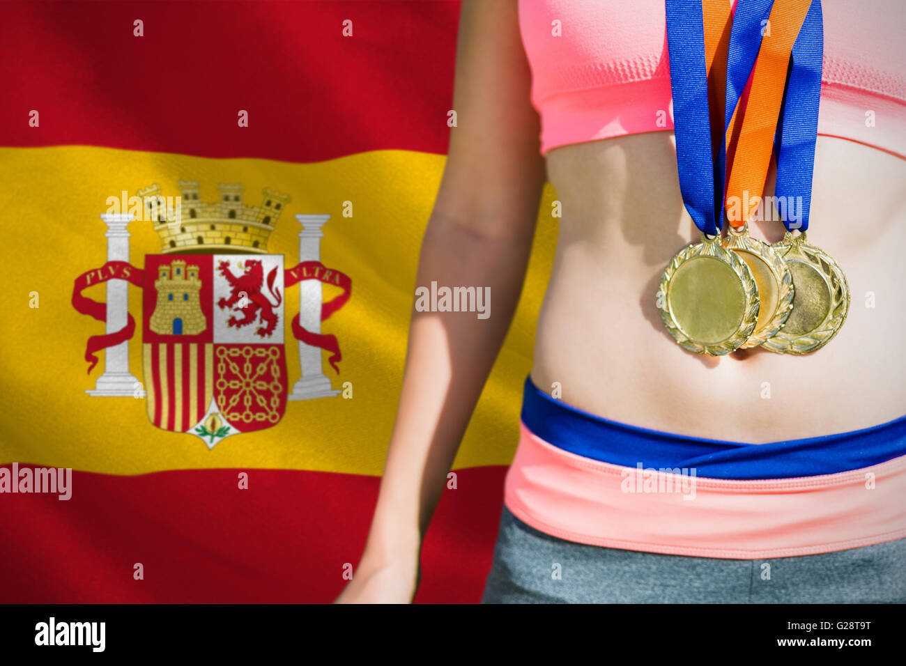 Composite image de la sportive avec des médailles à la poitrine Banque D'Images