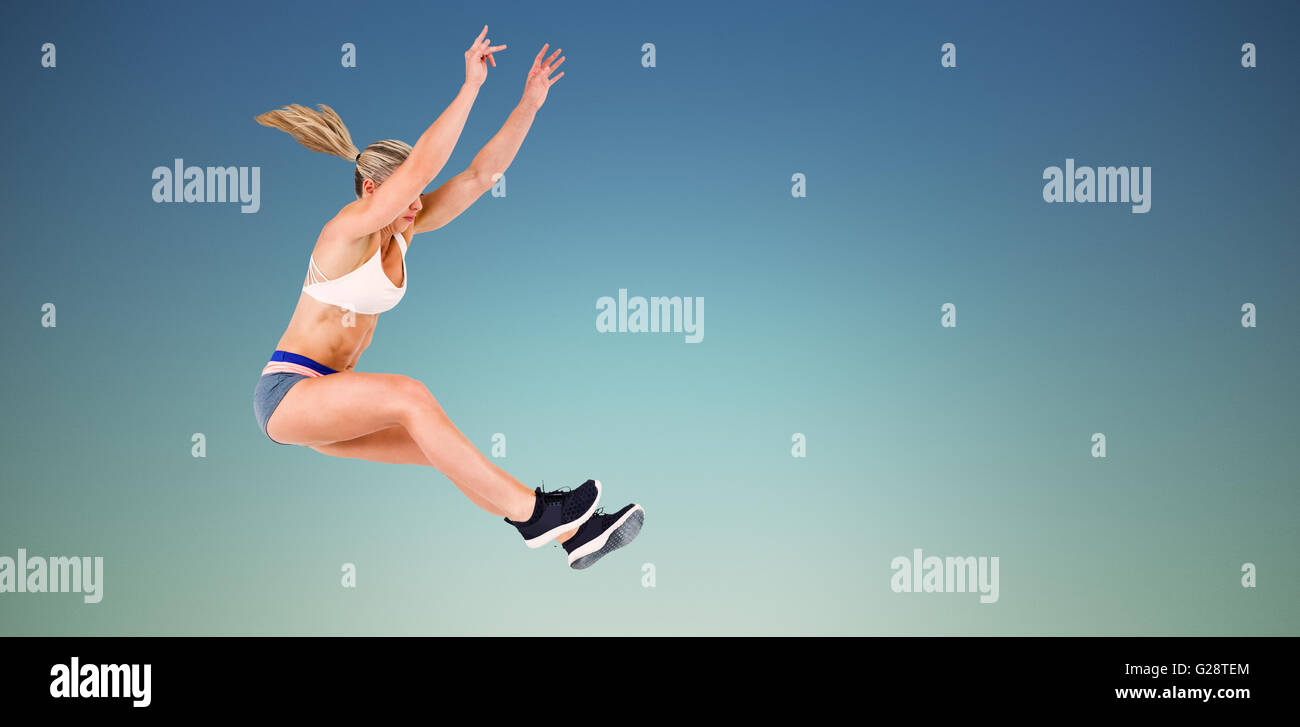 Image composite de saut à l'athlète féminine Banque D'Images