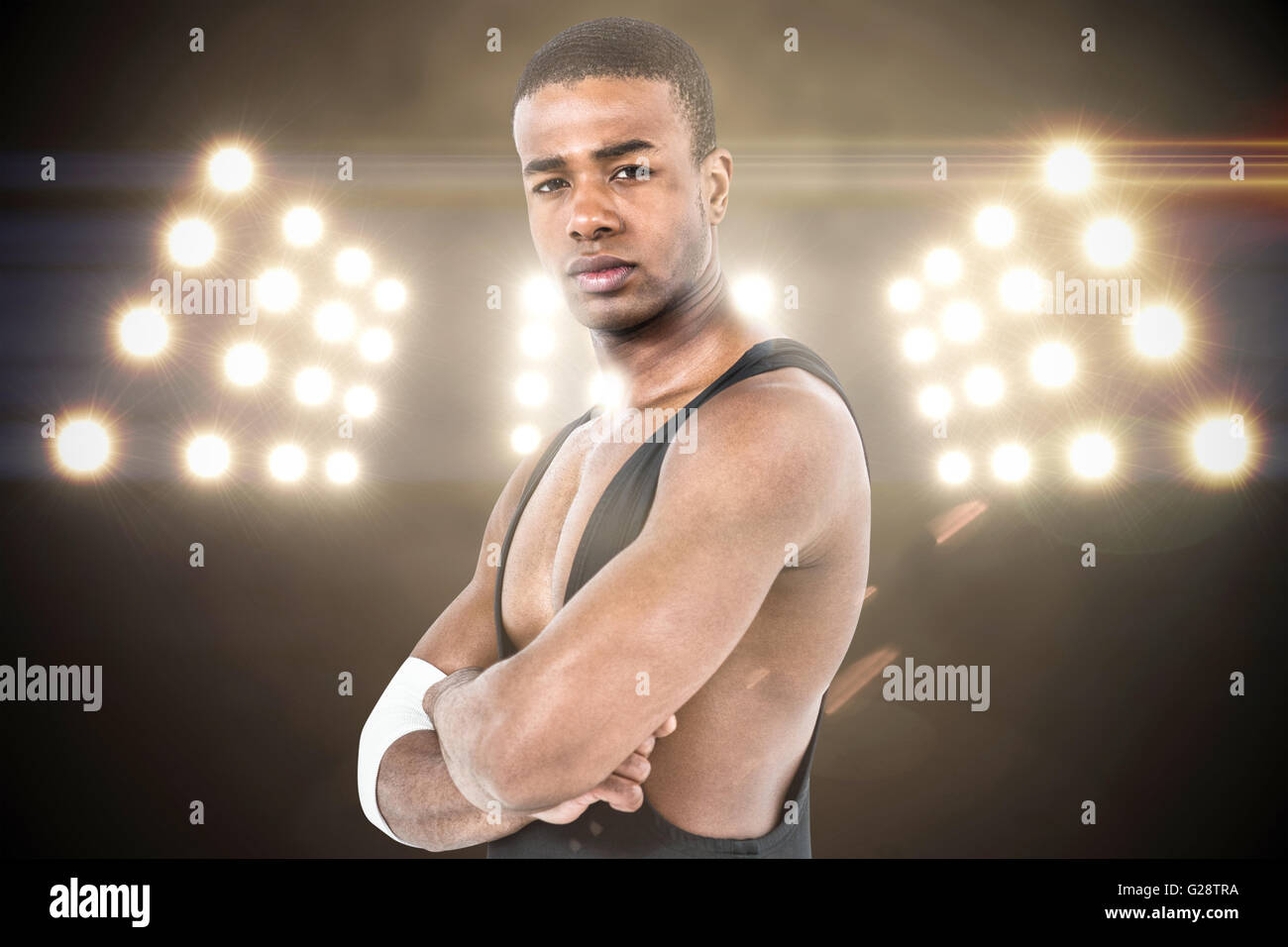 Image composite de l'athlète posant avec les bras croisés Banque D'Images