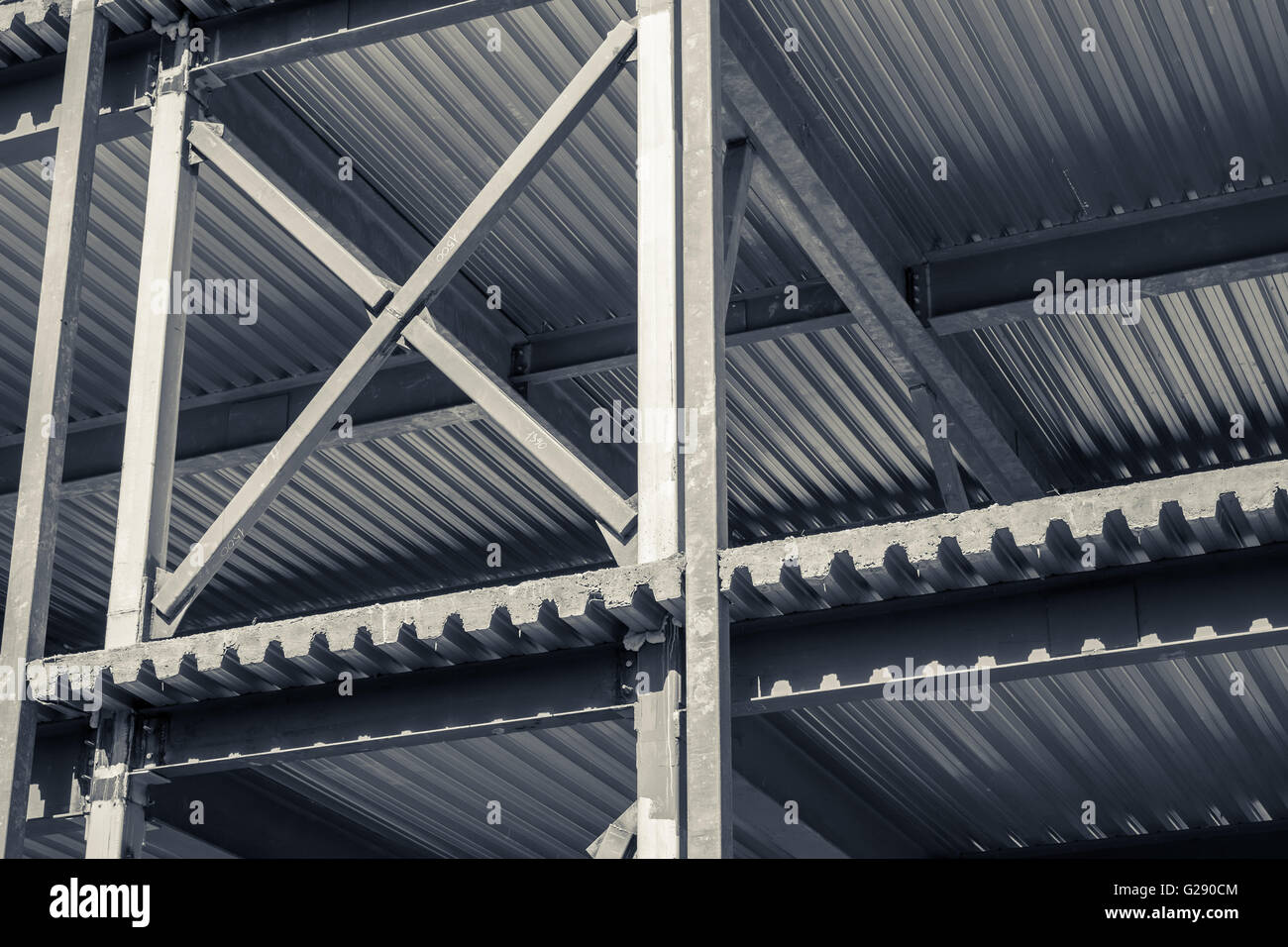 Bâtiment industriel moderne est en construction. Fragment monochrome abstrait Banque D'Images