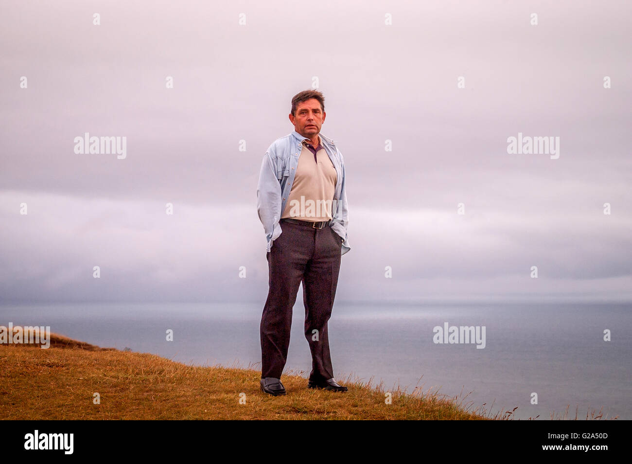 Keith Lane, d'Eastbourne, debout sur le dessus de Beachy Head, à l'endroit où sa femme, Maggie a sauté et s'est suicidé, Mark Banque D'Images