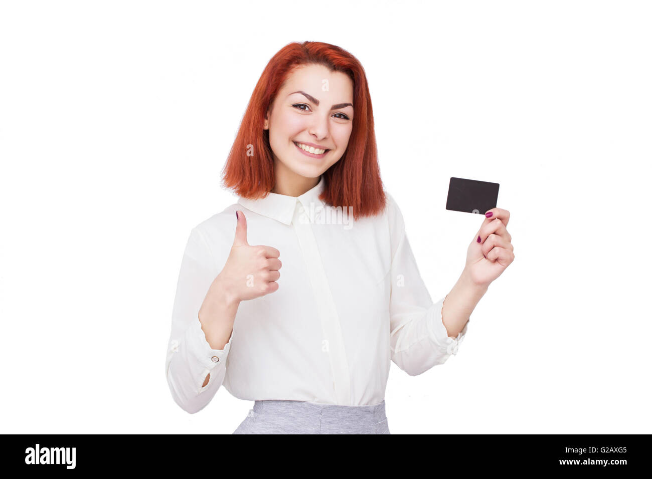 Happy woman holding white papier vierge Banque D'Images