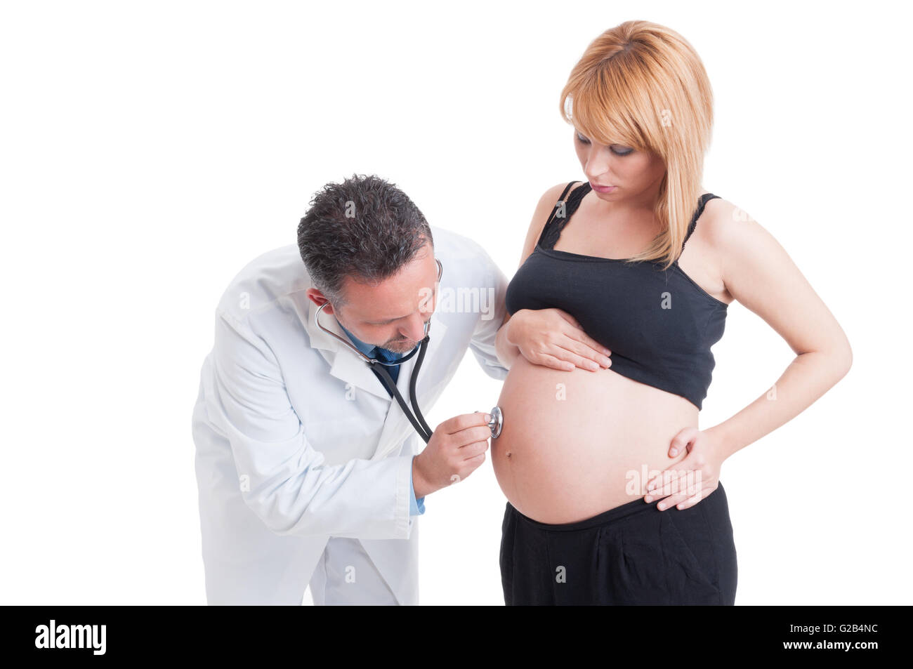Écoute infirmier femme enceinte ventre à l'aide de concept stéthoscope  isolé sur fond blanc Photo Stock - Alamy