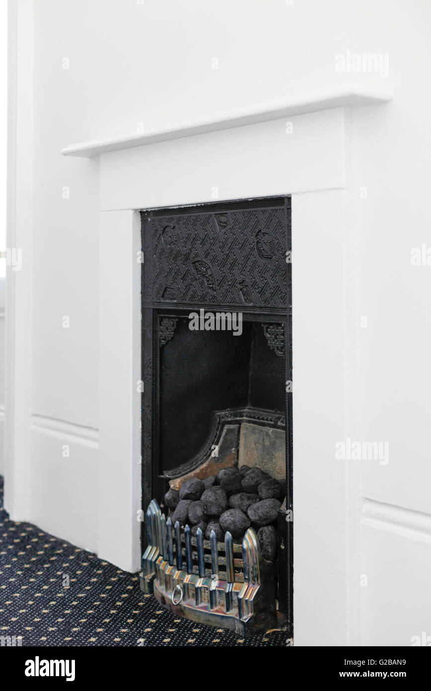 Vicarage Gate. Fermer la vue d'un foyer au charbon. Banque D'Images