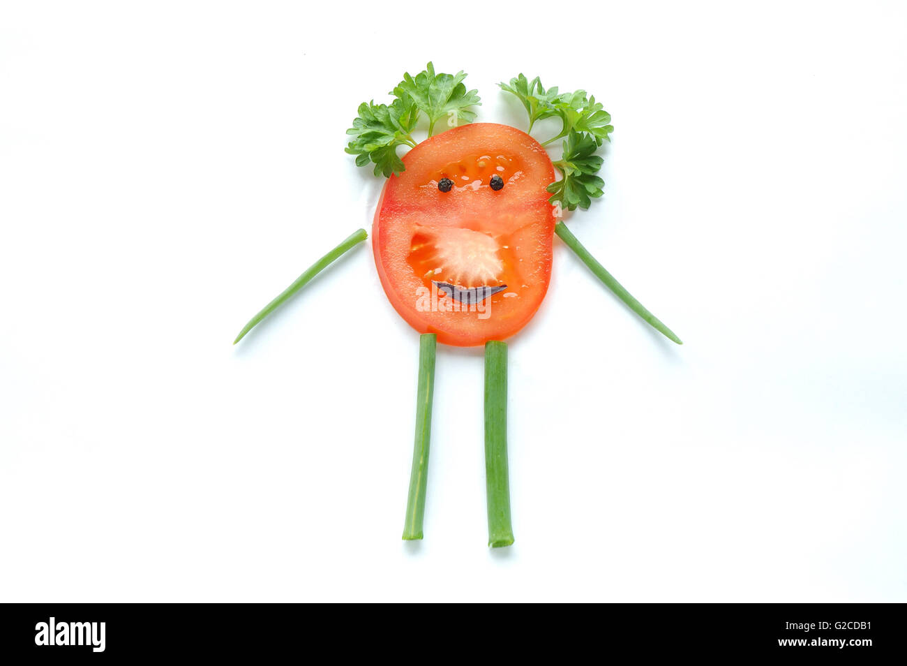 Funny snack-légumes pour les enfants sur fond blanc Banque D'Images