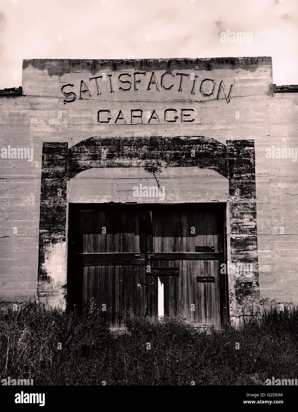 Ancien garage Satisfaction Banque D'Images