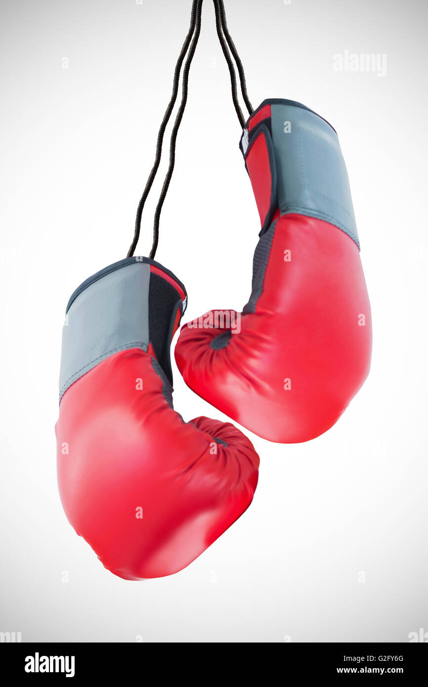 Gants de boxe attaché à fond blanc Banque D'Images