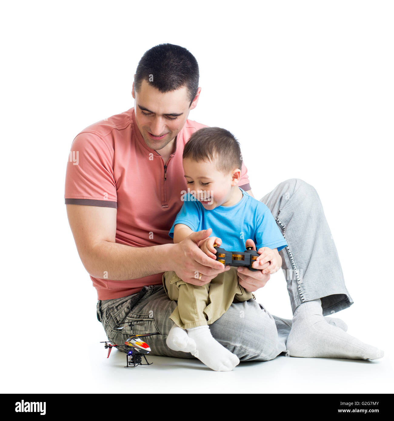 Père et fils avec l'hélicoptère jouet Banque D'Images