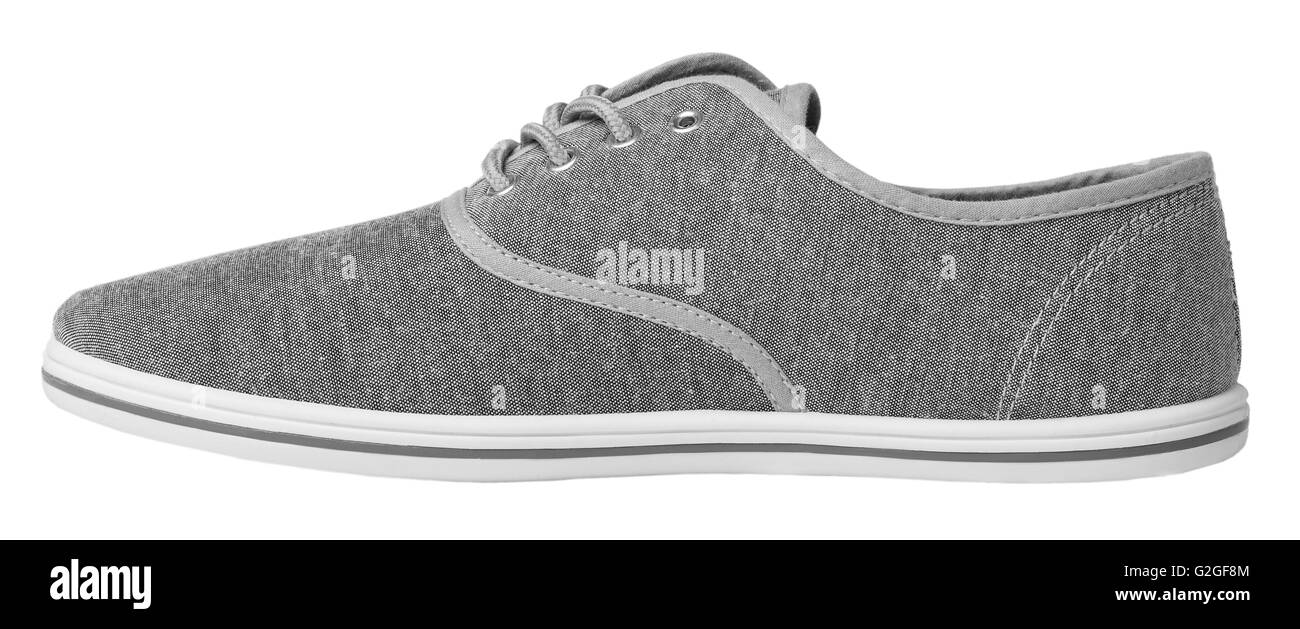 Sneaker gris isolé sur fond blanc Vue de côté Banque D'Images