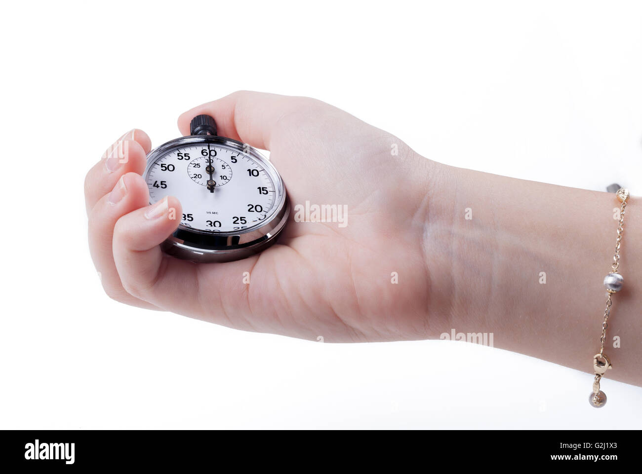 Hand Holding silver color Chronomètre mécanique isolated on white Banque D'Images