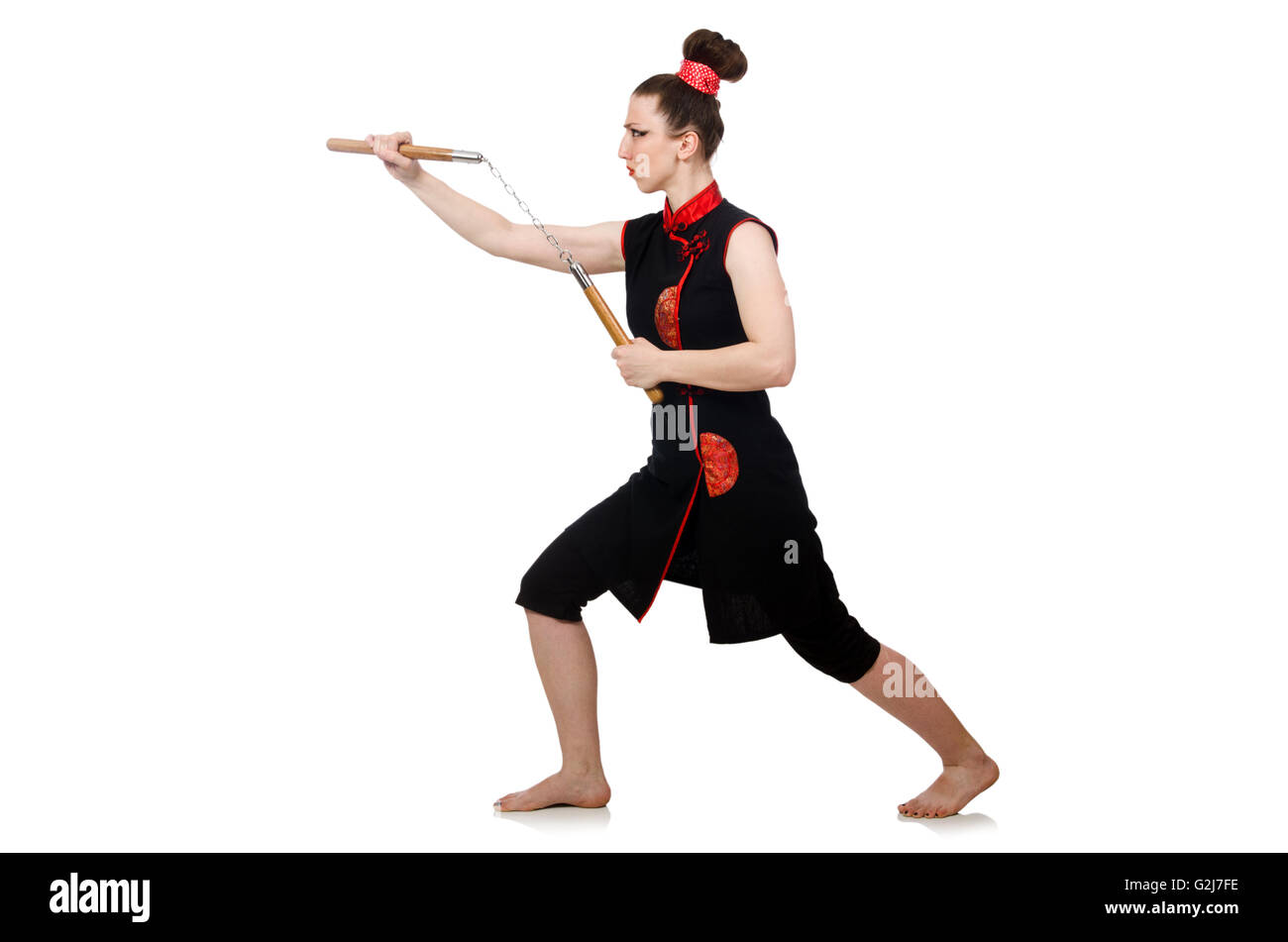 Femme drôle avec nunchucks isolated on white Banque D'Images