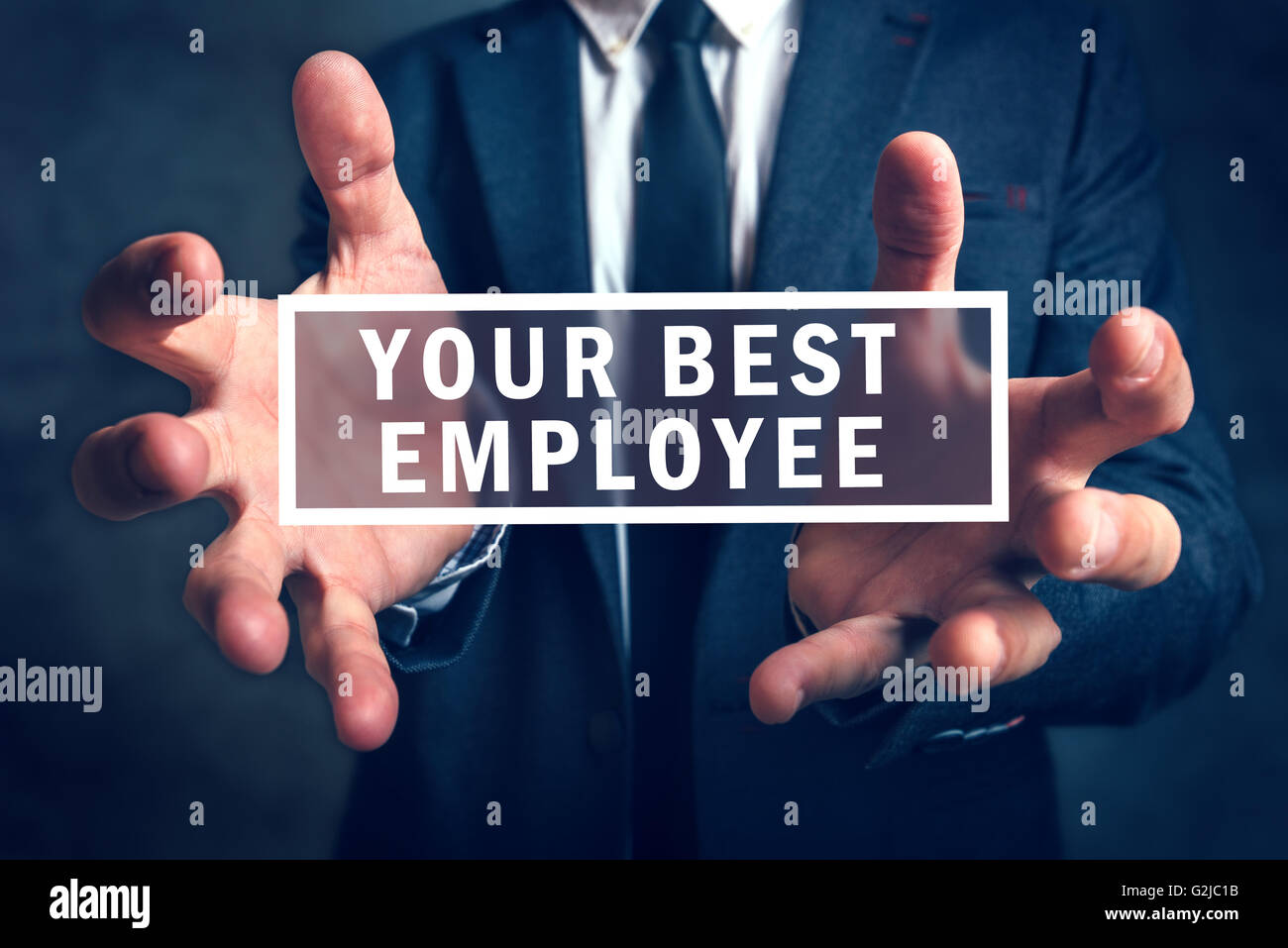 Gardez votre meilleur employé concept avec business manager en arrière-plan. Banque D'Images