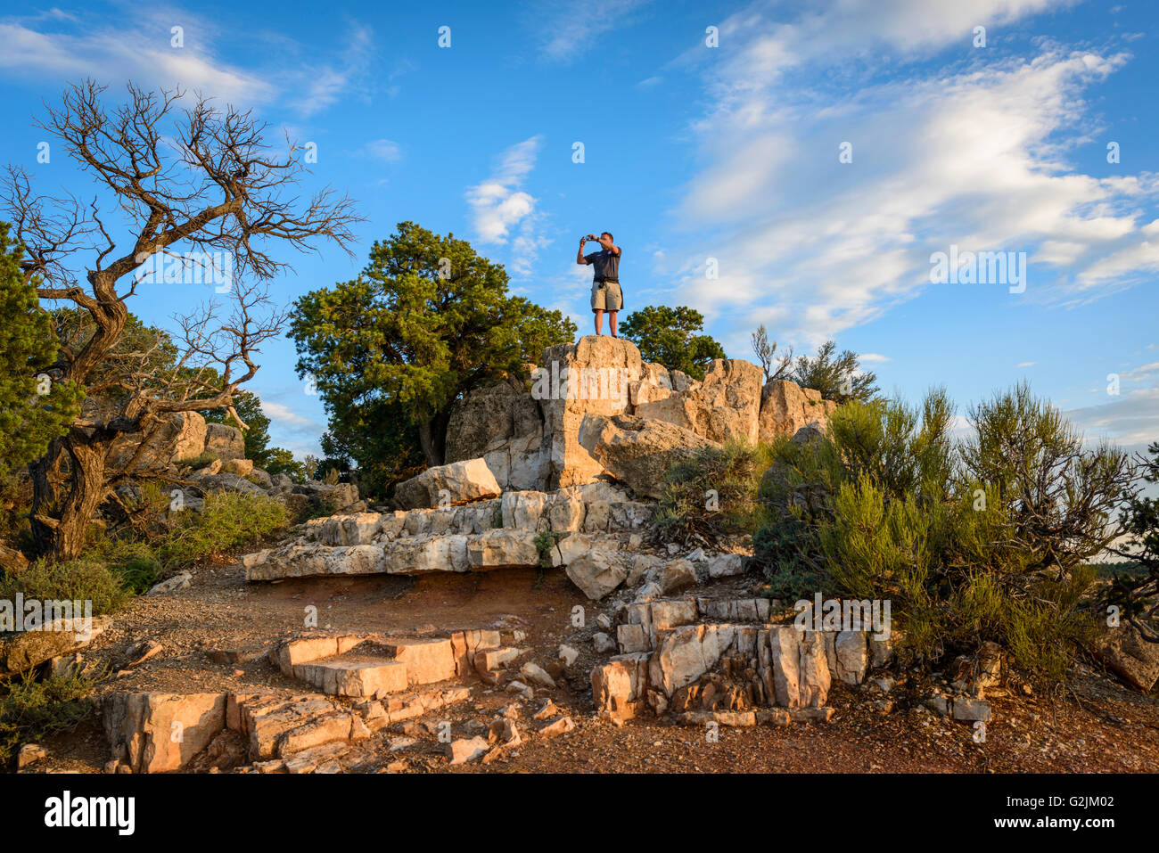 L'homme de prendre des photographies à Yaki Point, Grand Canyon, Arizona, USA Banque D'Images