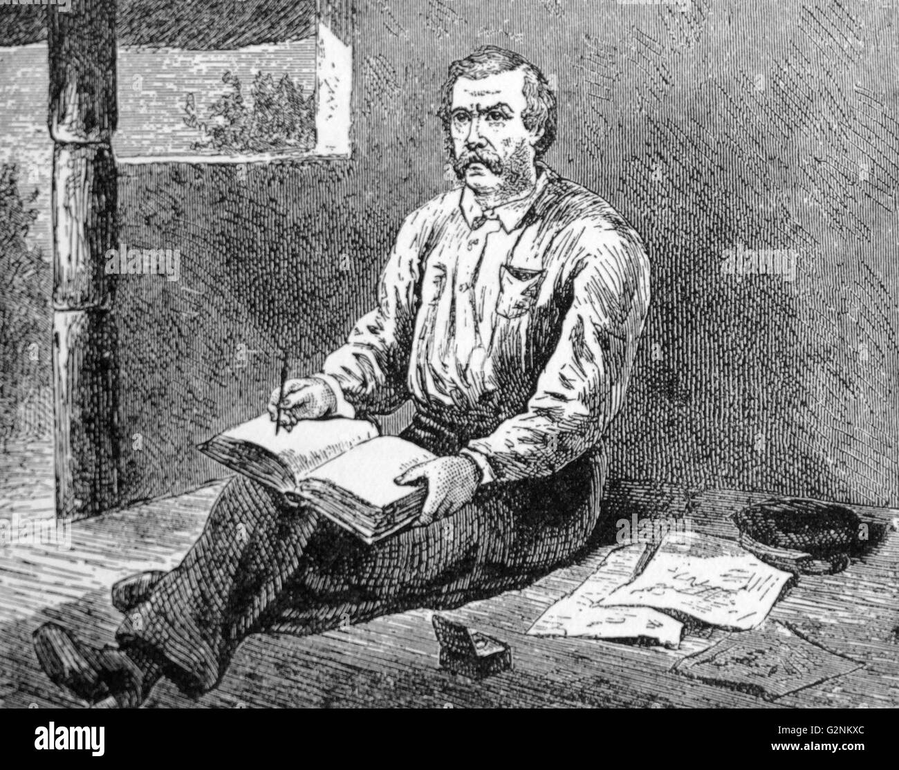 David Livingstone (1813-1873) au travail sur son journal. Banque D'Images