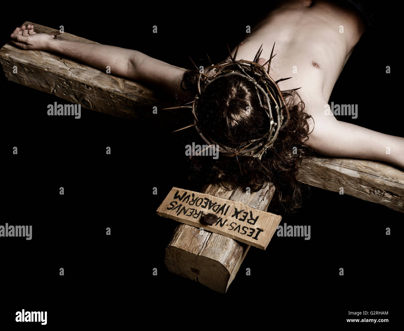 Close-up bras lorsque gisant mort le Christ sur la croix Banque D'Images