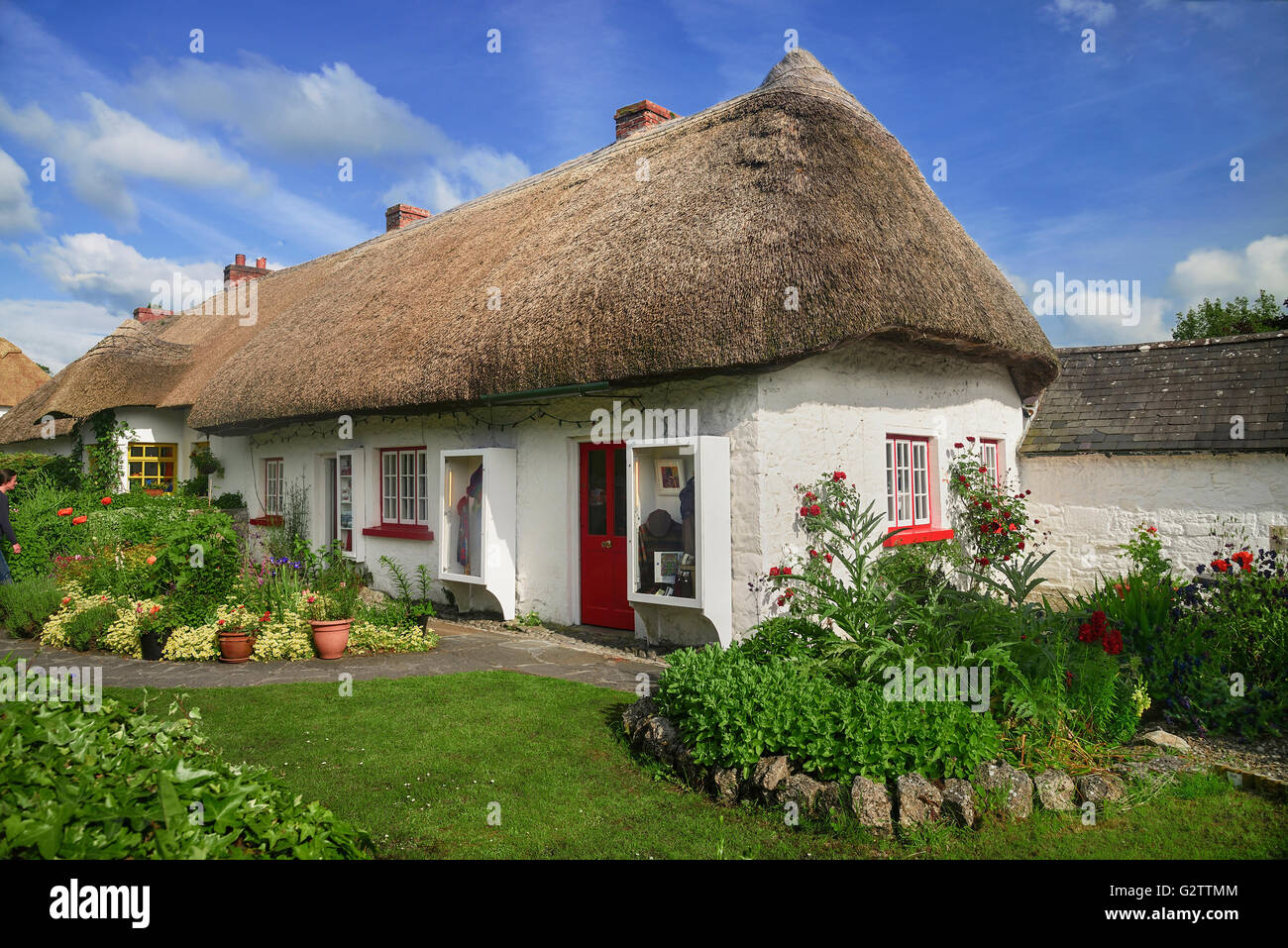 L'Irlande, Limerick, l'Adare, Fr Thatched cottage dans le village. Banque D'Images