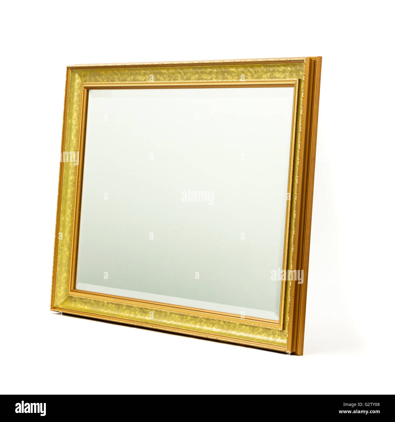 Miroir en verre biseauté dans cadre en bois doré Banque D'Images