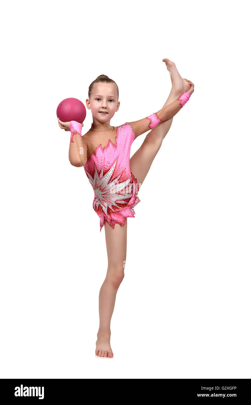 Petite fille gymnaste posant avec balle rose Banque D'Images