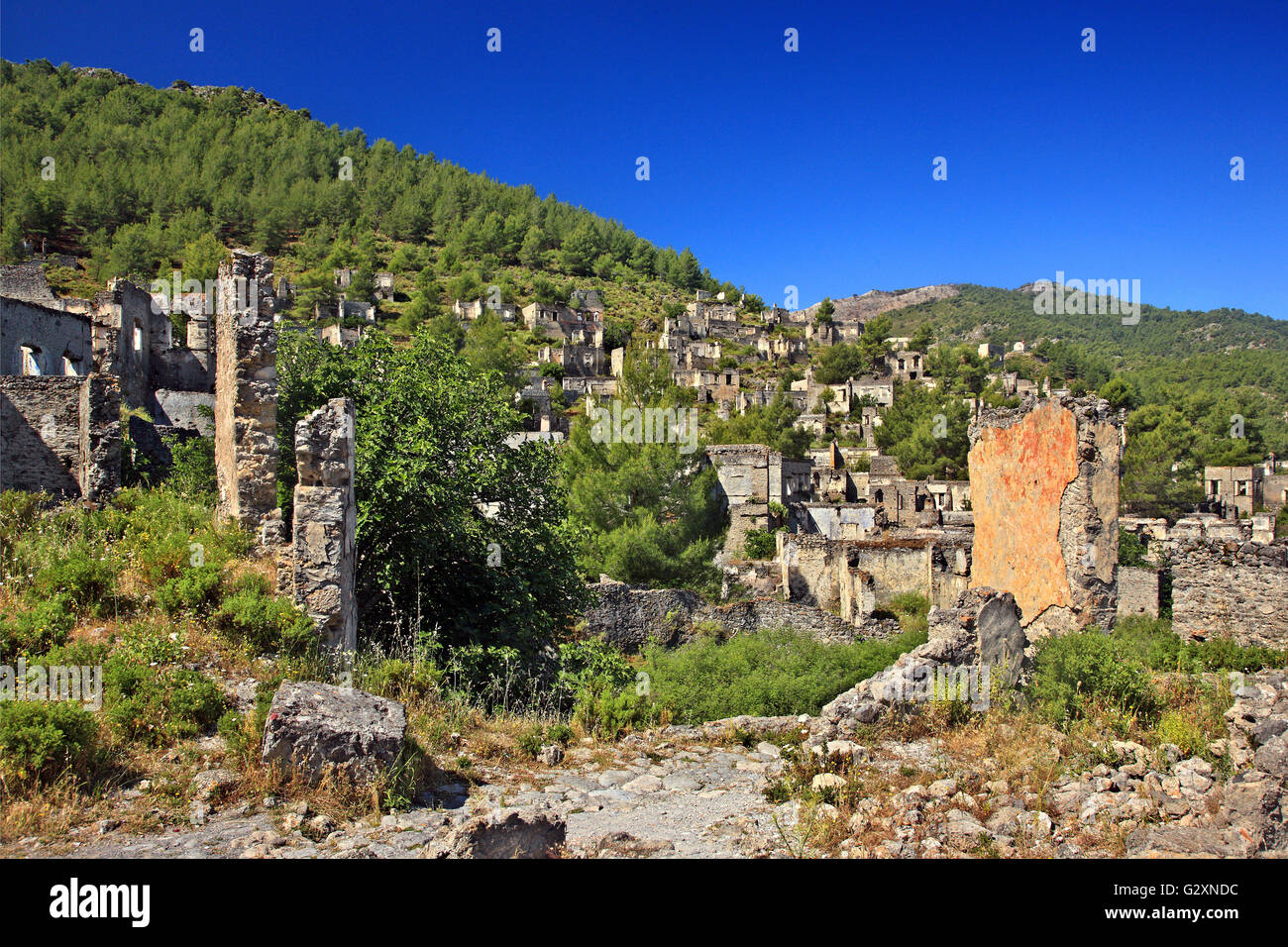 Vue partielle de la 'village' de Kayakoy Lycia, province de Mugla, Turquie. Banque D'Images