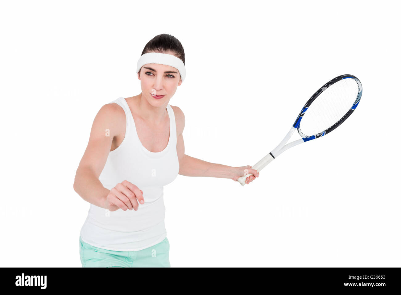 Athlète féminin jouant au tennis Banque D'Images