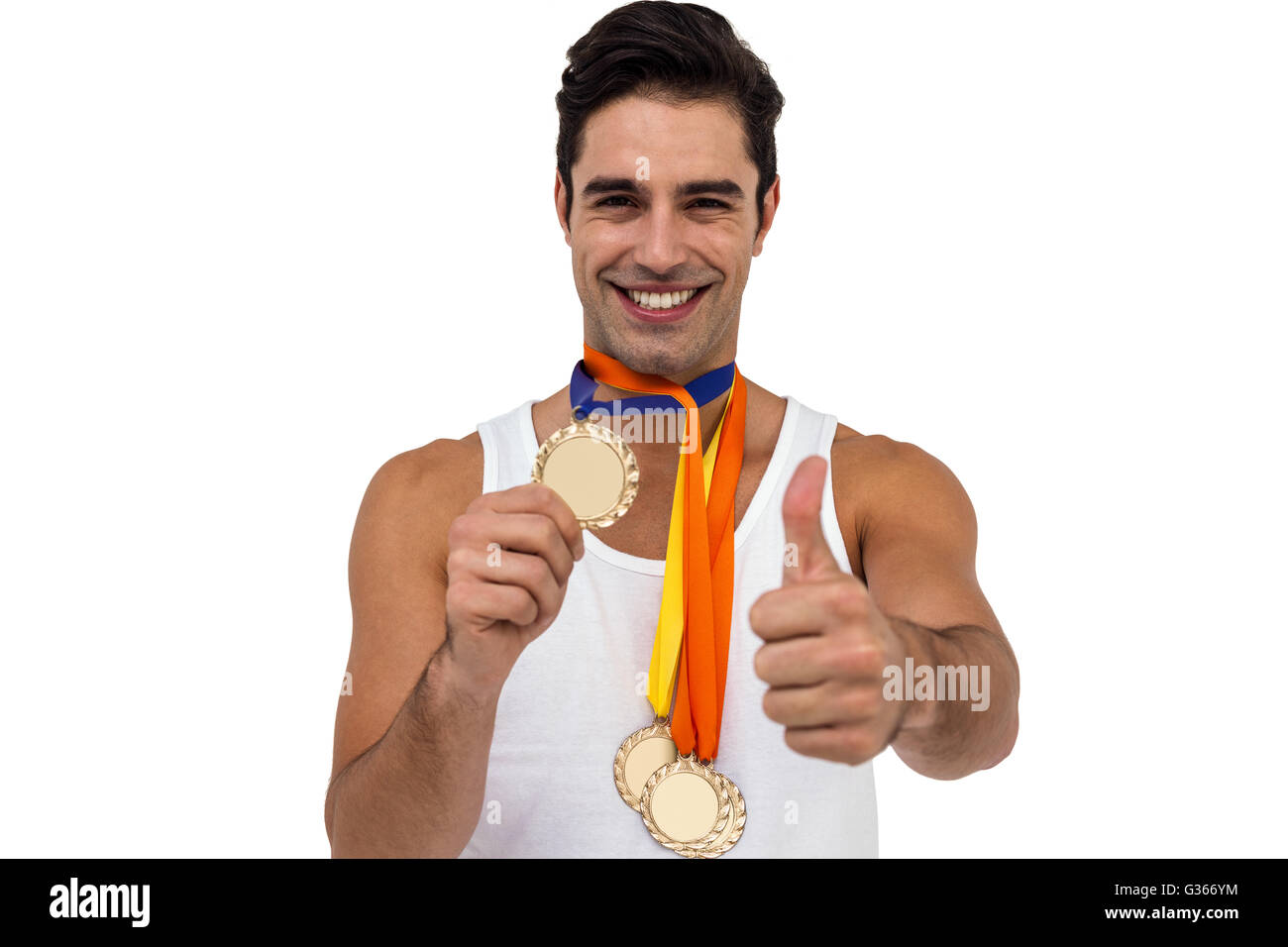 Athlète posant avec médailles d'or autour du cou Banque D'Images